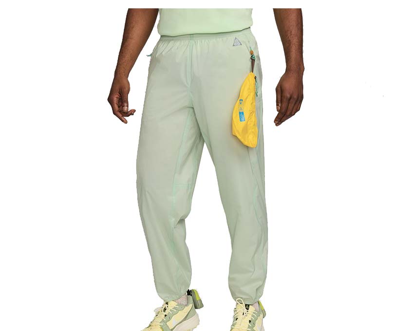 Nike guppy track pants sale