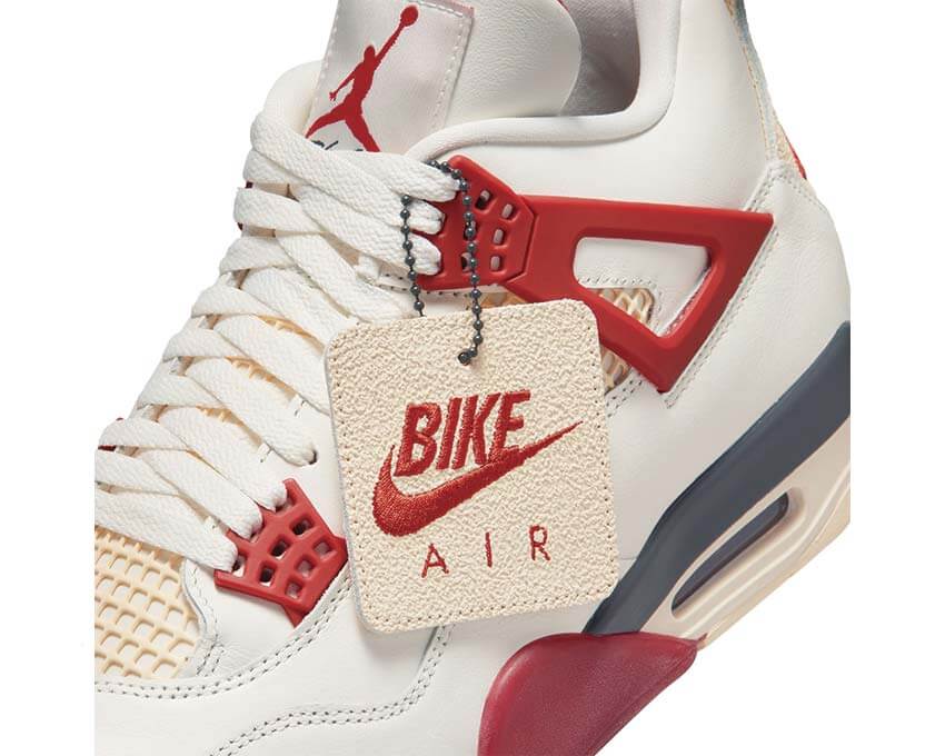 Air Jordan 4 Retro Nigel Sylvester vue latérale — tige cuir brique Cinnabar