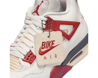 Air Jordan 4 Retro Nigel Sylvester vue latérale — tige cuir brique Cinnabar