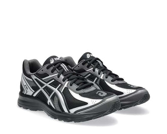 Asics Jog 100S Black/Pure Silver vue latérale — tige cuir rétro style vintage