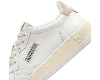 Autry Medalist Low Virgin side view — ivory leather women's sneaker