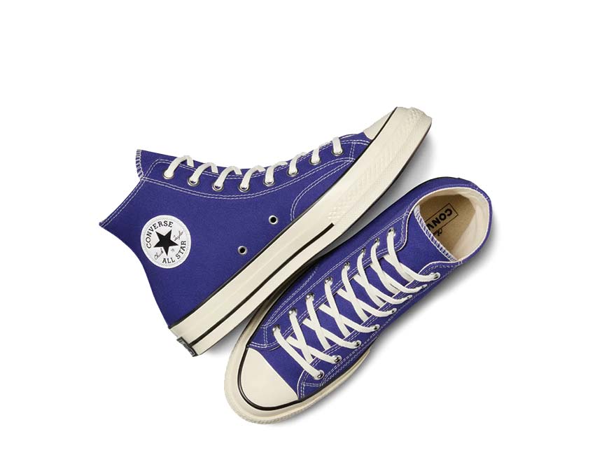 Black and blue converse high tops sales