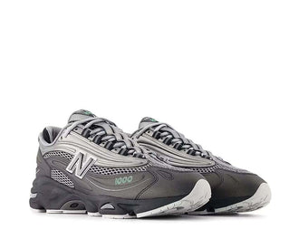 New Balance 1000 Black Silver vue latérale — tige cuir noir détails argent