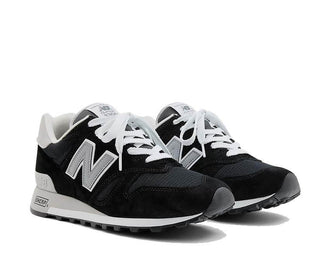 New Balance 1300 Schwarz Seitenansicht — klassische schwarze 1300 USA Silhouette