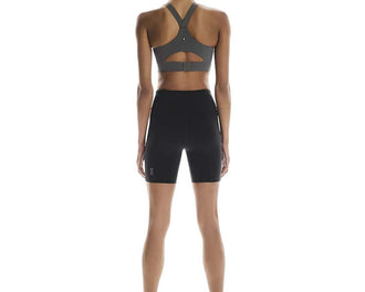On Performance Tights Short W Black — cycliste femme DryTec poches running