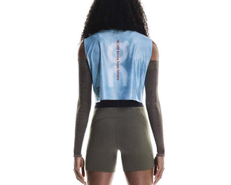 On Tights PLEASURES x The Loop Olive porté dos — poches arrière collant running femme