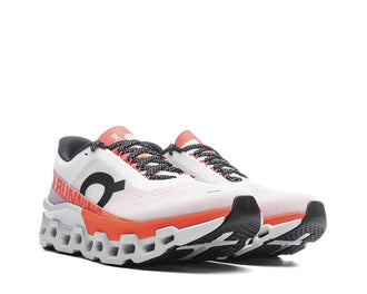 On Cloudmonster 2 White/Flame side view — breathable mesh upper