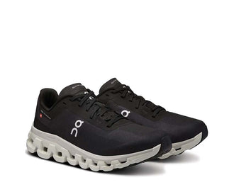 On Cloudflow 4 W Noir vue latérale — profil running rapide femme légère