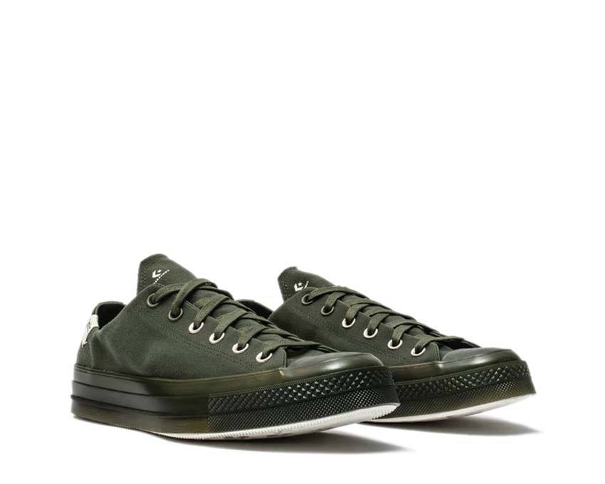 Converse Japanese fashion giant Comme des Garcons has hooked up with Converse once again Converse x John Elliott Skid Grip sneakers Rifle Green A06688C