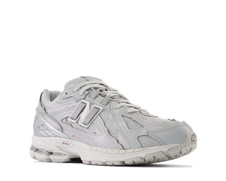 New Balance 1906 Protection Pack vista frontale – materiali riflettenti