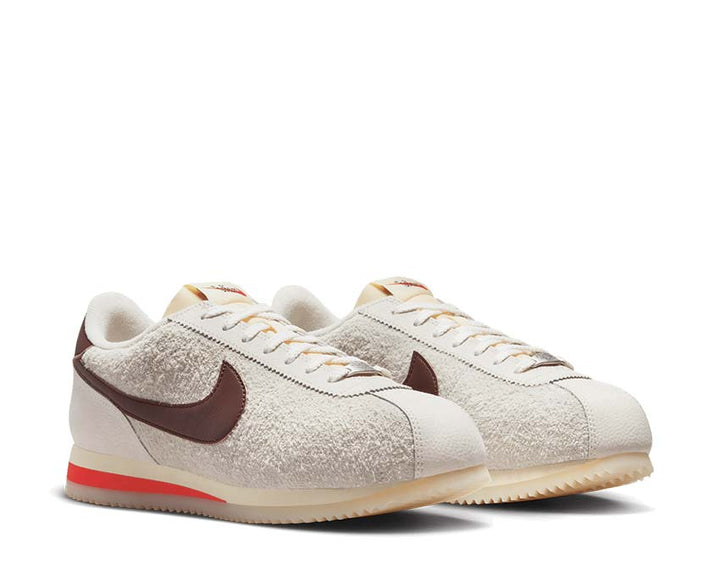 Nike Cortez '23 Wmns nike running shoe red white and blue background FD2013-100